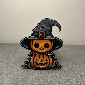Halloween Pumpkin aluminum hitch cover.
