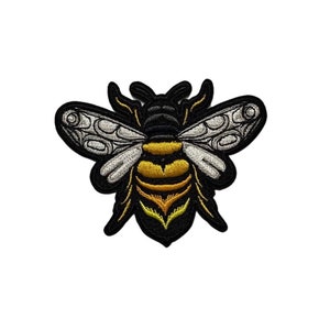 Può includere: Toppa ricamata a forma di ape nera e gialla con ali bianche.