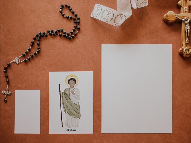 May include: A printable illustration of Saint Jude Thaddeus, a Catholic saint, with a halo and holding a staff. The illustration is on a white background with the words "St. Jude" printed below.