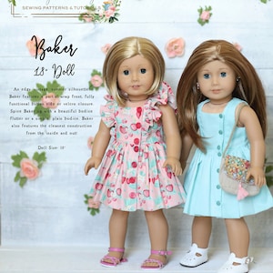 May include: Two 18-inch dolls wearing dresses. The doll on the left is wearing a pink dress with a strawberry print and a white ruffle. The doll on the right is wearing a light blue dress. Both dolls are wearing sandals.