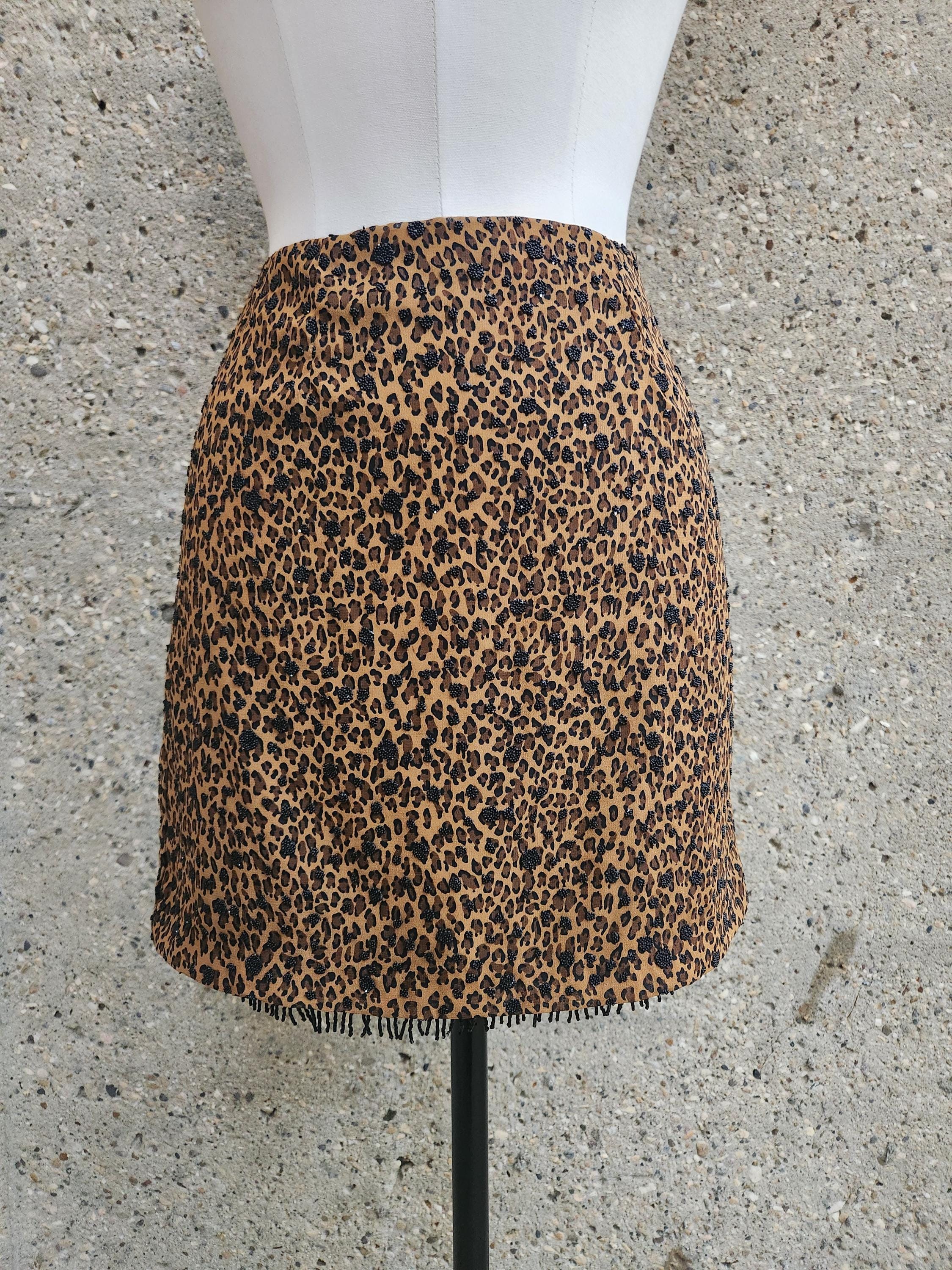 [HILLDA] ★ Leopard Tassel Mini Skirt MUSINSA | HILLDA Leopard Tassel Mini Skirt [Brown]