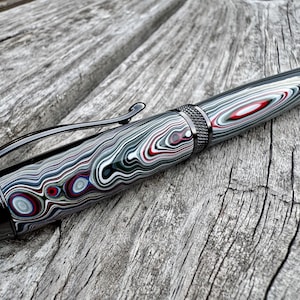 Fordite Rollerball Pen – Fordite and Black Resin with Striking Gunmetal Chrome Hardware