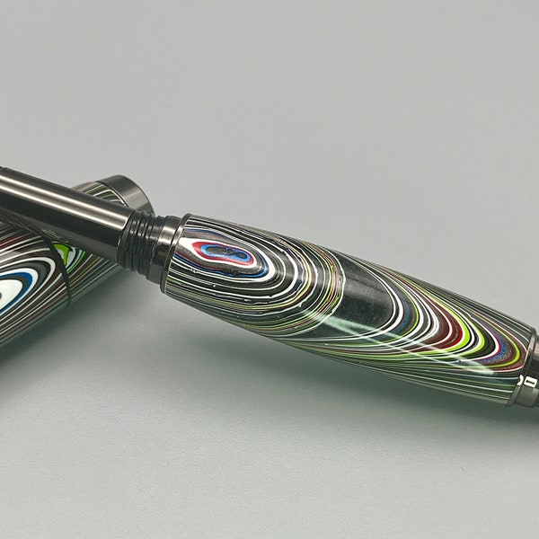 Handcrafted Fordite Rollerball Pen: Gunmetal Chrome Accentuating Luxe Dark Grey Resin