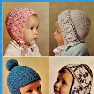 May include: Four different knitted baby hats in various colors and patterns. The hats are all made with soft yarn and have a variety of styles, including a pink hat with a lace pattern, a white hat with a leaf pattern, a blue hat with a textured pattern, and a gray and white hat with a geometric pattern.