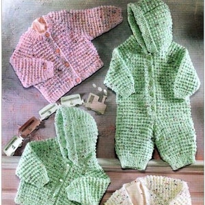May include: Four knitted baby garments in pink, green and white with speckled patterns. The garments include a cardigan, a hooded cardigan, a hooded jumpsuit and a cardigan with a V-neck.