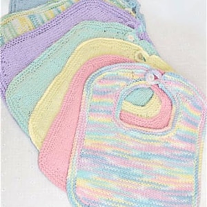 May include: A stack of handmade knitted baby bibs in pastel colors. The bibs are in shades of blue, yellow, pink, and green. The bibs have a rounded shape with a neck opening and a button closure. The bibs are made of soft yarn.