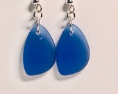 Sapphire blue organic shaped recycled sea glass style earrings on sterling French hooks. Beads are recycled tumbled beach glass.