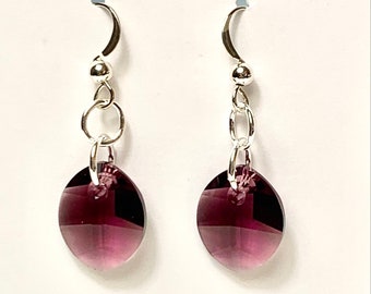 Amethyst Swarovski crystal faceted oval pear drop earrings on sterling silver french hooks.
