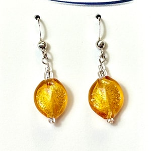 Gold Handmade Venetian Glass earrings in twisted shaped beads. Silver lines Venetian glass jewelry. Murano glass earrings Glass Italy