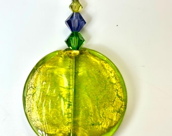Peridot green Venetian Murano large coin shaped glass pendant necklace, Swarovski accents. Black leather cord. Trendy pendant. Bold fun