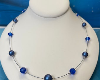 Majestic blue Swarovski crystal and pearl floating illusion necklace.  Bright blue. Cobalt sapphire royal blue necklace