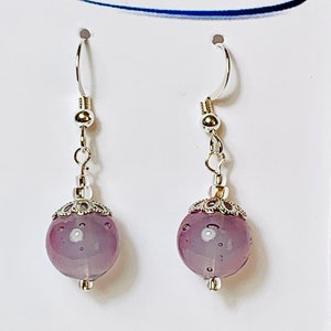 Frosted plum translucent Venetian Glass earrings silver bead caps and sterling french hooks. Murano glass earrings. Venetian glass jewelry