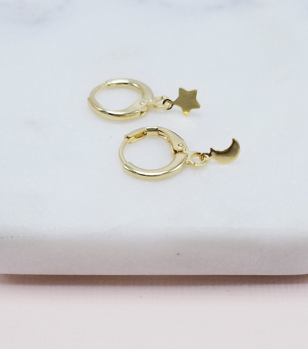 Moon Emblem Sterling Silver Huggie Hoop Earrings plated in 14K Gold main image 1