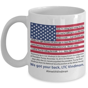 May include: White ceramic coffee mug with a red, white, and blue American flag design. The mug features a quote about the importance of truth and the text "We got your back, LTC Vindman. #ImwithVindman".