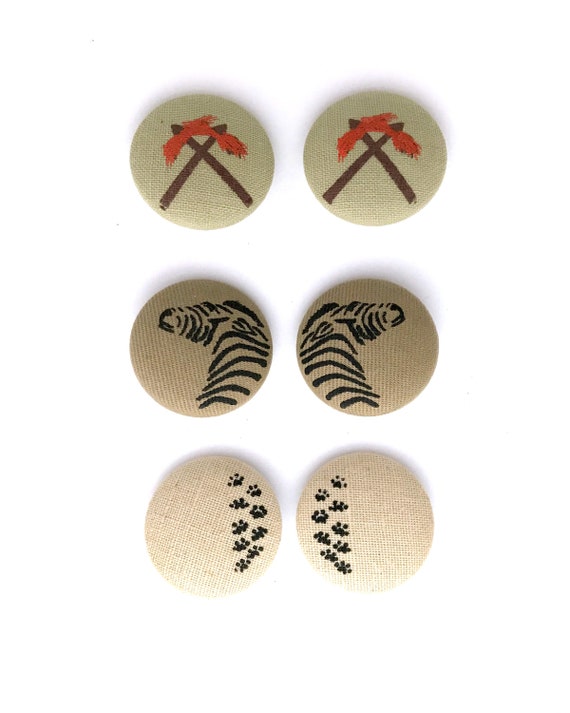 Three pairs 1970s Africa-themed clip-on earrings