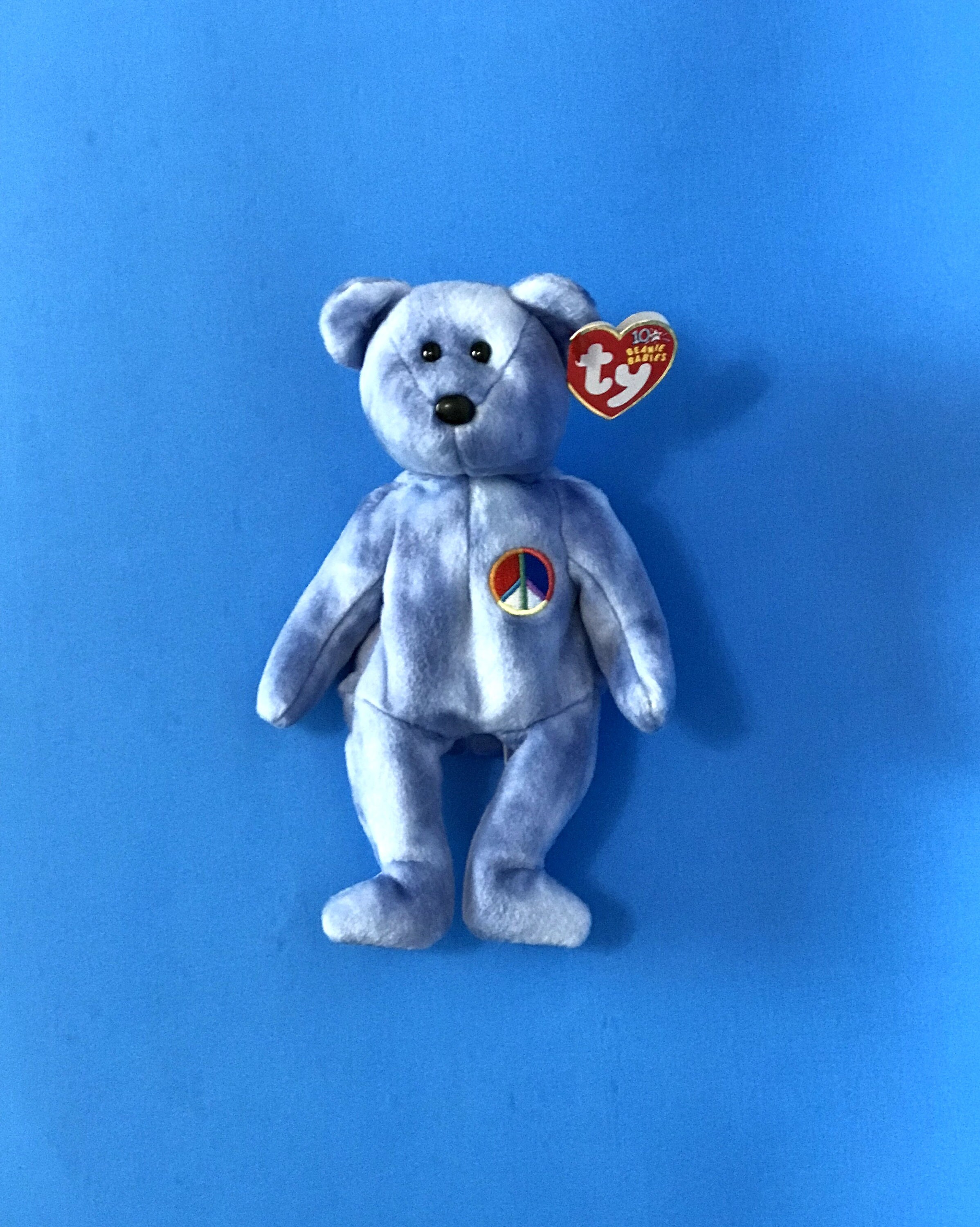 Peace bear beanie baby value best sale