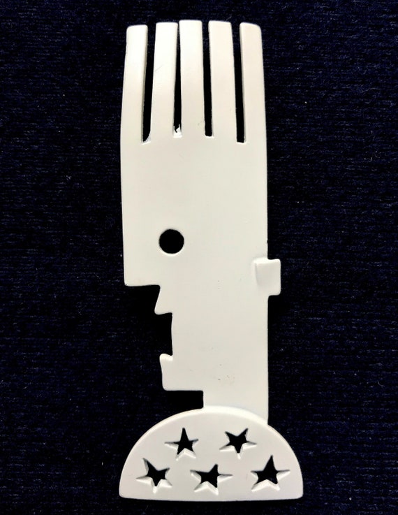 1980s white metal profile pin by JJ 1988