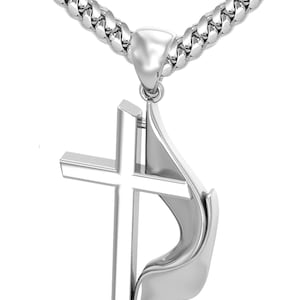 May include: Silver necklace with a pendant featuring a cross and a flame design. The chain is a curb style.