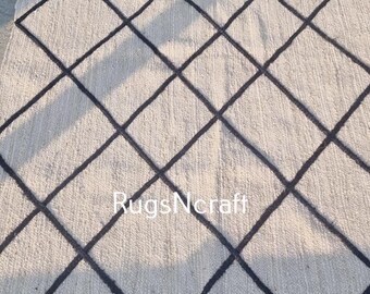 Handgeweven gevlochten jute vloerkleed: milieuvriendelijk boho-tapijt