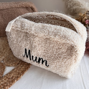 EMBROIDERED terry toiletry bag with the first name of your choice