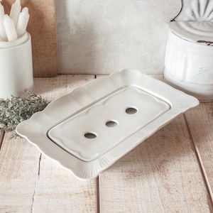 Plato antiguo de PILLIVUYT para espárragos, de cerámica blanca.