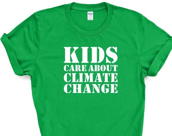 May include: Green t-shirt with white text that reads "KIDS CARE ABOUT CLIMATE CHANGE".