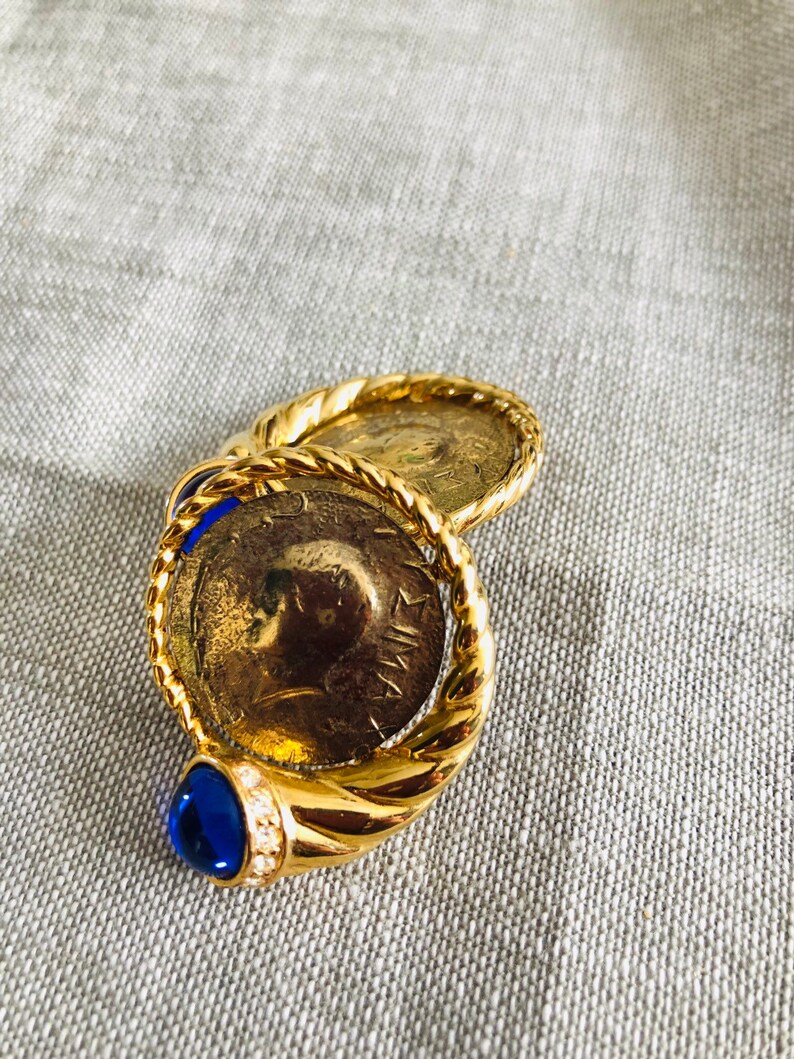 Gold Tone Greek Coin With Blue Jewel Clip on Earrings