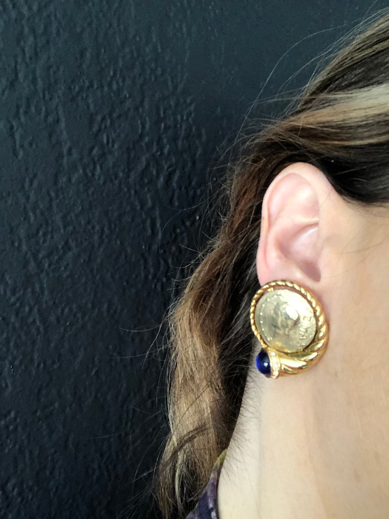 Gold Tone Greek Coin With Blue Jewel Clip on Earrings