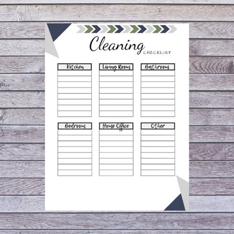 May include: A white cleaning checklist with sections for kitchen, living room, bathroom, bedroom, home office, and other. The title "Cleaning Checklist" is in a script font, with a chevron design at the top.
