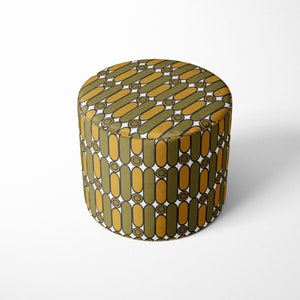 May include: A round, green and yellow patterned ottoman with a white background. The pattern features vertical stripes of yellow and green ovals with white circles in between.