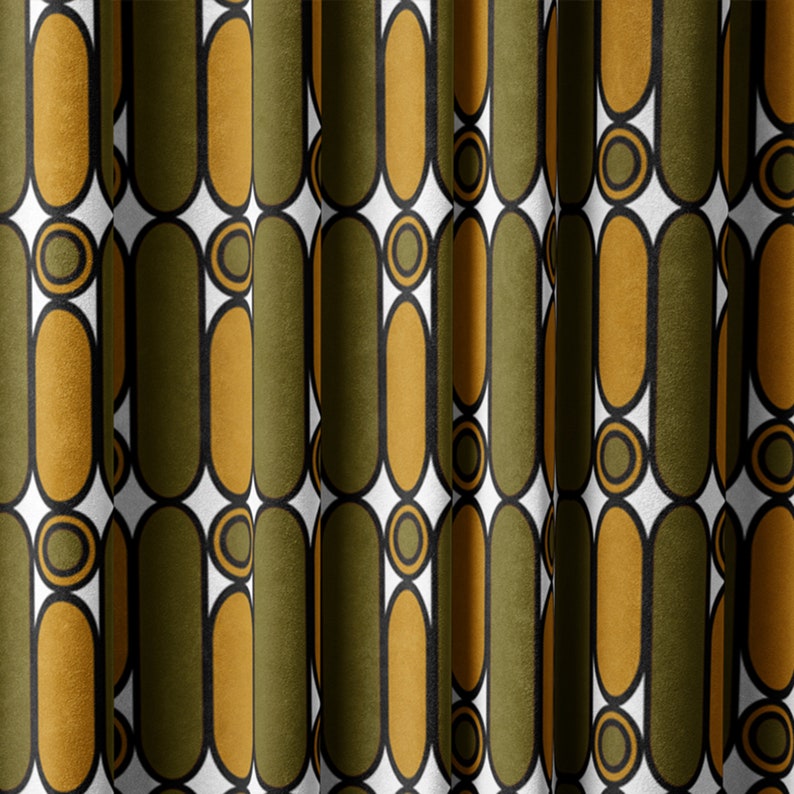 May include: A fabric with a repeating pattern of green and gold ovals with black outlines. The ovals are arranged in vertical rows and are separated by white circles with black outlines.