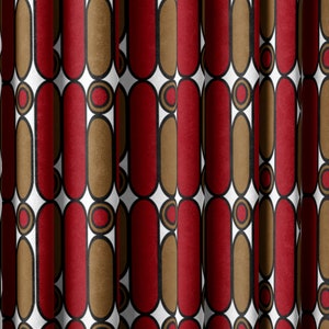 May include: Red and brown geometric pattern fabric with a white background. The pattern features repeating oval shapes with a circle inside.