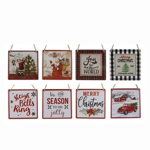 May include: Set of eight red and white Christmas-themed metal signs with various holiday sayings and images. The signs feature Santa Claus, a Christmas tree, a red truck, and a plaid pattern.