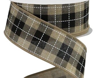 May include: A roll of decorative ribbon with a plaid pattern in black, tan, and white. The ribbon is made of a textured material and is ideal for crafts, gift wrapping, or seasonal decor.