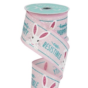 May include: Pink and teal ribbon with a white bunny rabbit design and the text "ear-resistible" and "hippity hoppity".