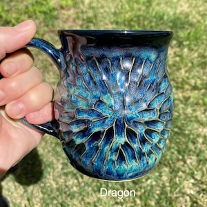 handmade pottery mug carved by hand