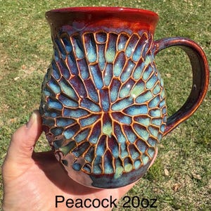 handmade ceramic pottery mug carved by hand