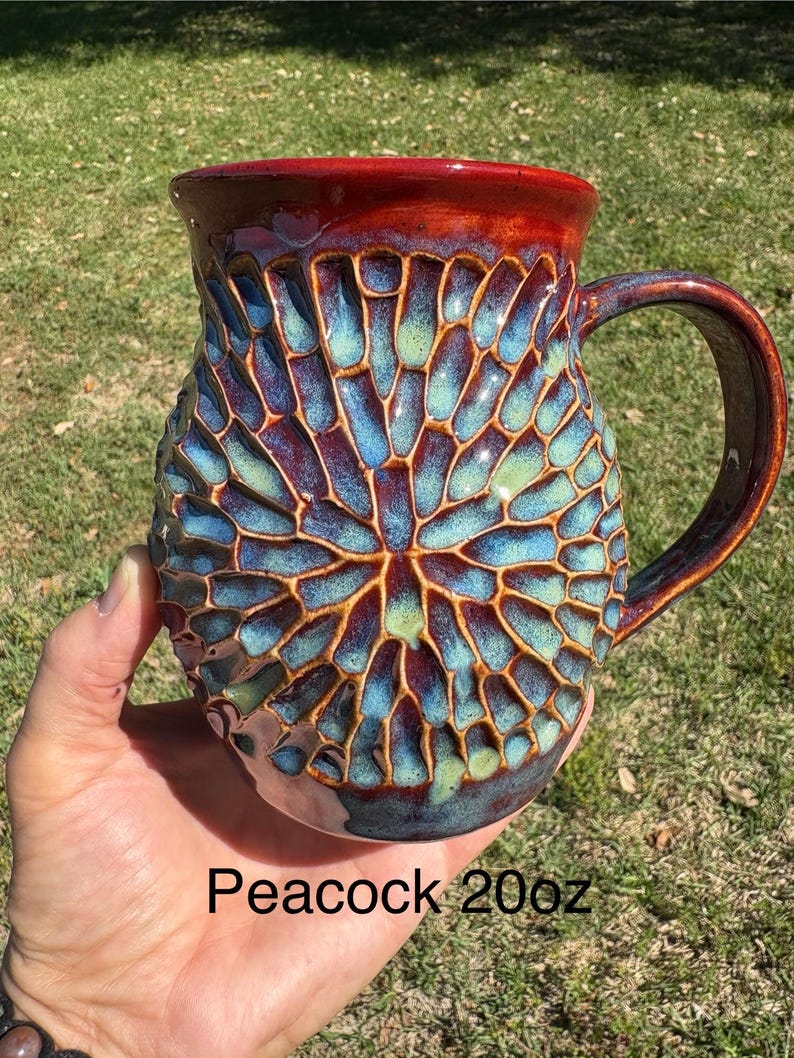 handmade ceramic pottery mug carved by hand