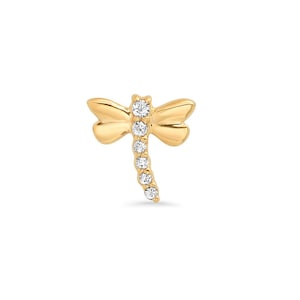 May include: A gold dragonfly earring with clear cubic zirconia stones.