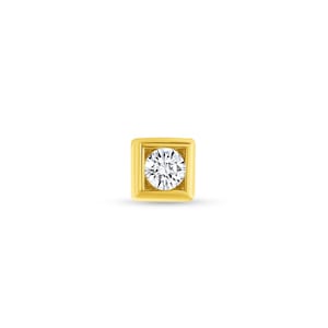 May include: A single gold earring with a square setting and a round, clear diamond.