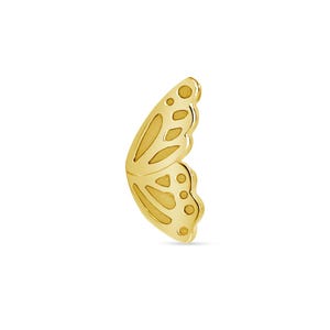 May include: A gold butterfly wing charm with intricate details. The wing is shaped like a butterfly wing and has a delicate design.