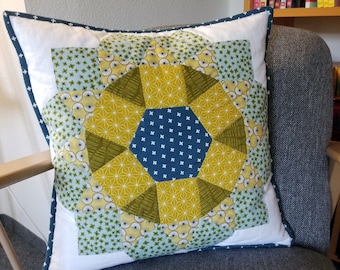 Patchwork cushion. Hand-sewn with love and appliqued and finished with a sewing machine.