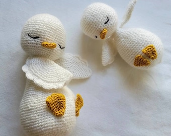 Crocheted sleeping ducks in very soft wool and cotton, ideal for newborn photo sessions, gifts, baby room decoration...