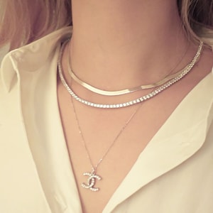 Chanel snake necklace deals