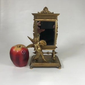 Antique French Gilt Bronze Table Top Mirror W/ Putti as Artist )