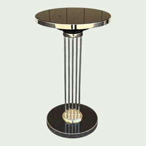 Puede incluir: Una mesa auxiliar redonda con tapa y base negras. La mesa tiene una estructura de metal plateado con varillas verticales que sostienen la tapa. La base es de un material oscuro y moteado, y la tapa es una superficie oscura y reflectante.