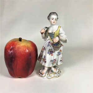 Meissen Porcelain Girl Holding Grape Basket & Scythe