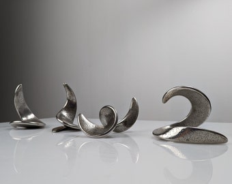 Set of spiral steel sculptures signed by the artist 1980s