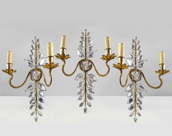 Set of three floral sconces by Maison Bagues in crystal and gold metal