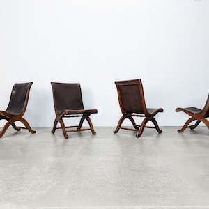 Set of four chairs by Pierre Lottier for Almazan 1950s